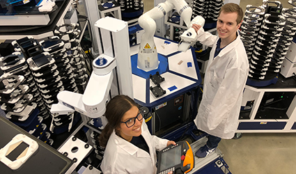 Two scientists using HighRes equipment