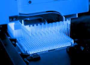 an image of lab pipettes being filled